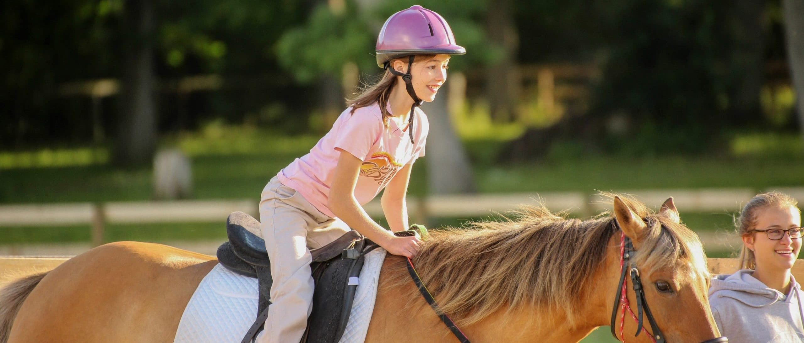 Skylar on horse for Therapeutic Riding
